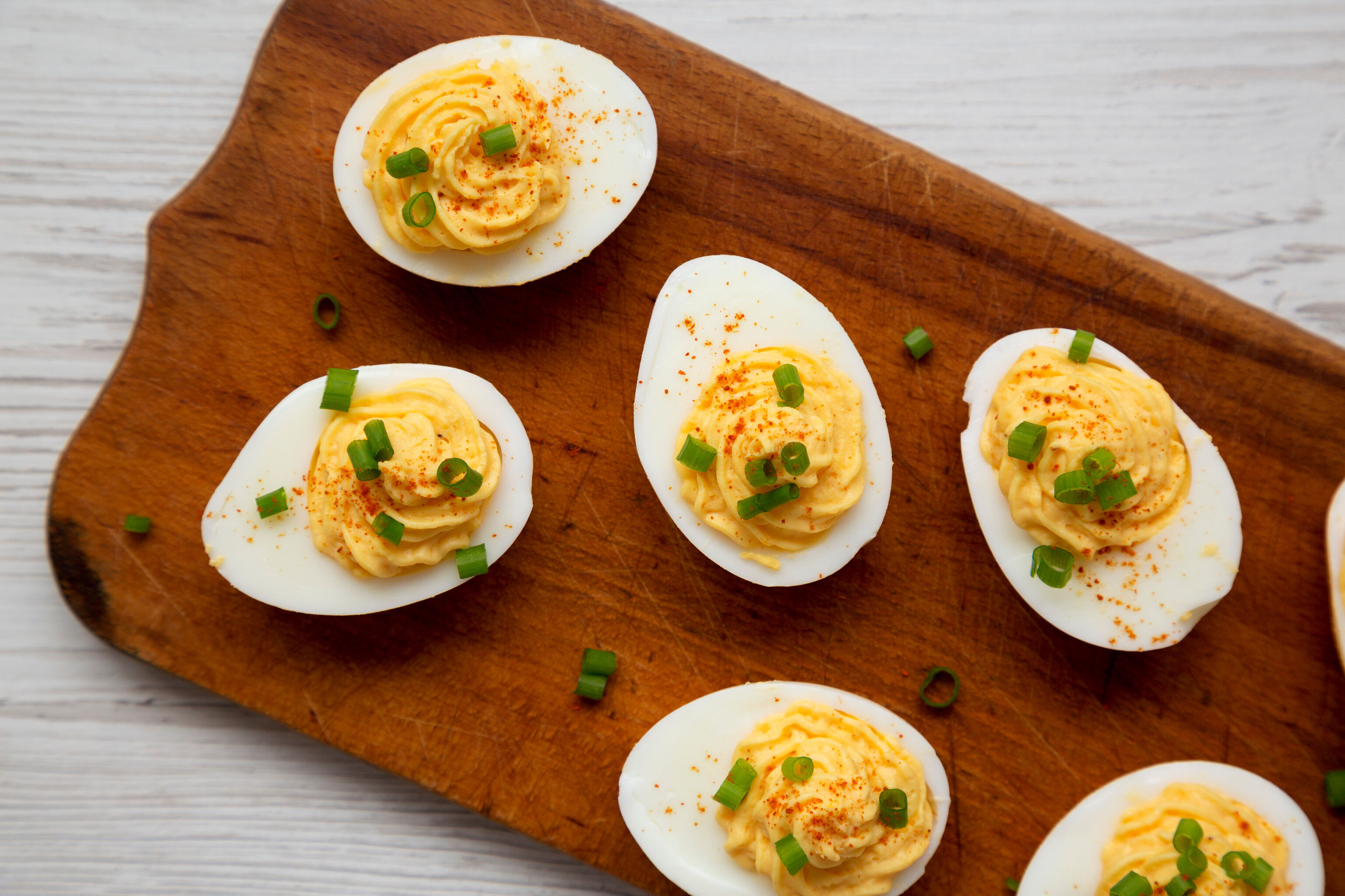 Deviled Eggs with Pickled Mustard Seeds and Candied Bacon