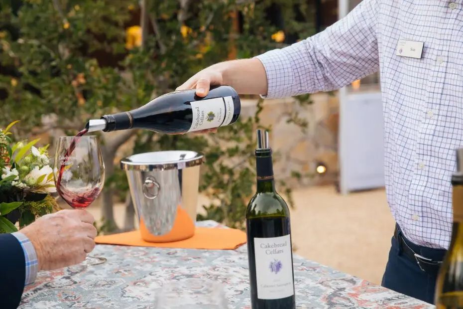 Guest being poured wine tastes at Visitor Center Grand Opening Party October 2019