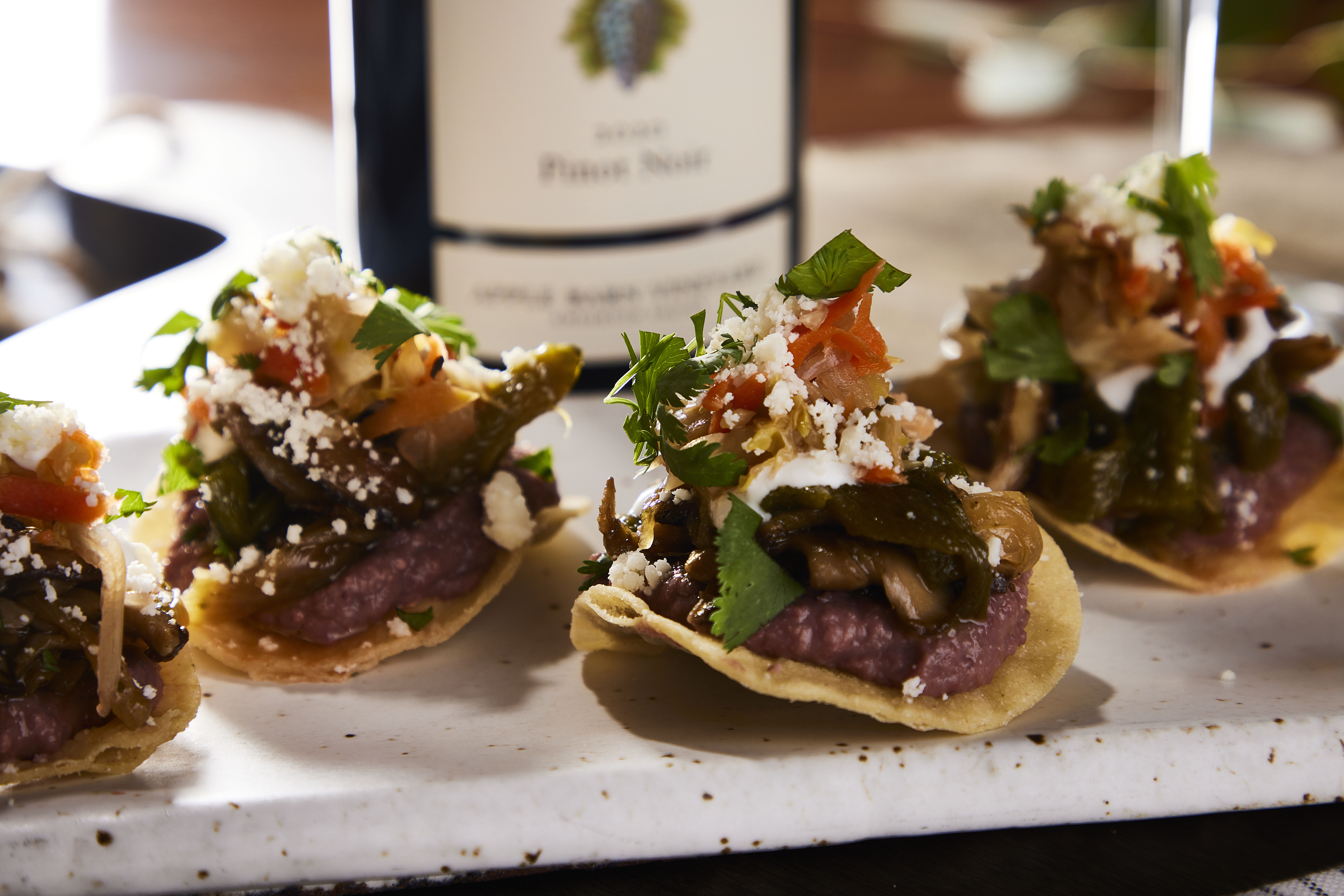 Wild Mushroom Tostadas With Lime Crema,Queso Seco & Cilantro