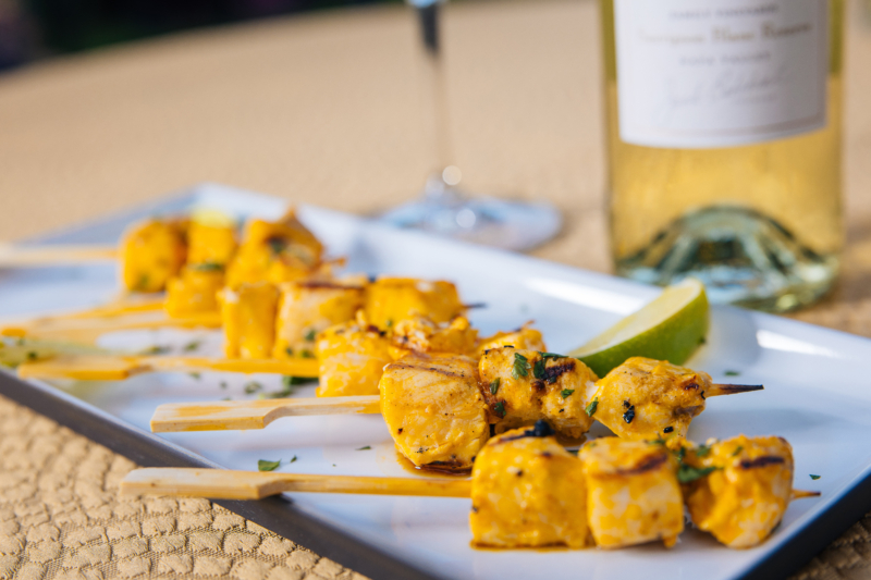 Cubes of marinated swordfish on skewers
